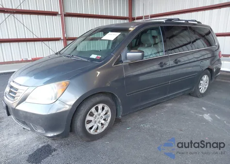 2010 Honda Odyssey Ex-L z USA, uszkodzony, nr VIN 5FNRL3H70AB043127